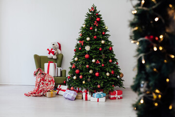 Christmas tree pine with gifts for the new year decor background place for the inscription