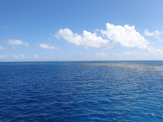 The stunning sunsets, beaches, coral reefs and huts on the Belize Islands in the Caribbean Sea