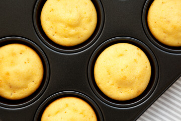 Homemade Cornbread Muffins, top view. Flat lay, overhead, from above. Close-up.