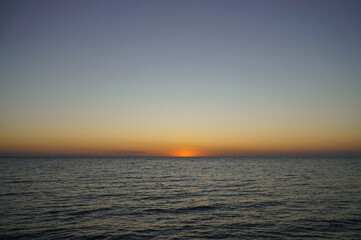 Fototapeta premium Sun rising over the sea. Dawn over the Sea of Azov.