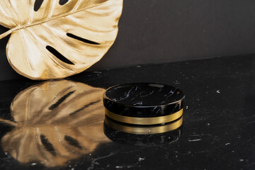 black and gold product display