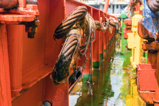 Slings stored at starbord side of an anchor handling tug boat