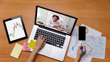 Fototapeta na wymiar Business long distance video call, businessman and businesswoman analysis financial report using videoconference application for virtual communication, online meeting . Covid-19 work from home.