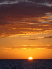 The stunning sunsets, beaches, coral reefs and huts on the Belize Islands in the Caribbean Sea