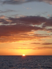 Fototapeta premium The stunning sunsets, beaches, coral reefs and huts on the Belize Islands in the Caribbean Sea