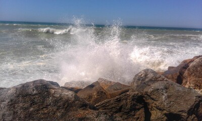 waves breaking on the beach