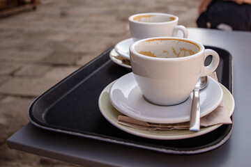empty cup of coffee in italian coffee bar in Venezia, Venice, Italy. Cappuccino, caffé