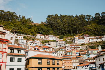 Fototapeta na wymiar Cityscape of Cudillero village, in the north of Spain. Cudillero is a charming village in Asturias, placed on a hill of the Atlantic coastline, with picturesque architecture
