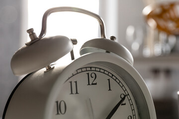 close-up of the bell of a classic table alarm clock