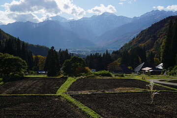 Autumn colorful foliage. mountains have 3 different colors made by nature, white, red, green. 