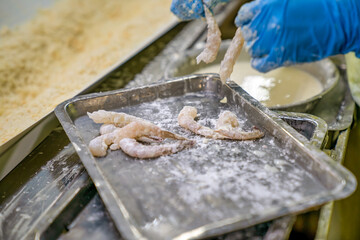 Processing crispy breaded shrimp in a food factory in Vietnam