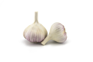 Garlic bulbs in close-up on white background