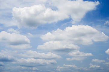 beautiful blue sky and white fluffy cloud horizon outdoor for background.