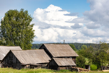 Fototapeta na wymiar View of the village in Russia. Old wooden houses