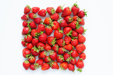 red raw fresh strawberries on white background, close view 