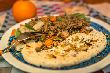 close up Grilled swordfish fillet with fried garlic and quinoa with vegetables