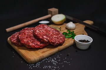 Raw meat with wooden table