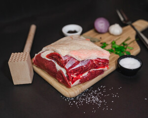 Raw meat with wooden table