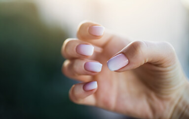 Beautiful woman's nails with beautiful french manicure ombre peach and white © The Len