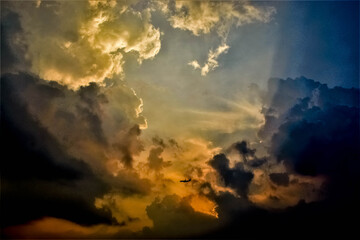 sun rays and clouds