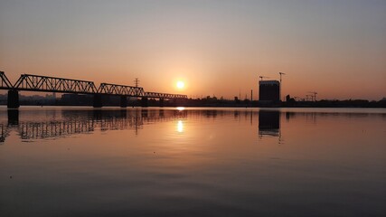 Fototapeta premium sunset over the river