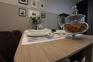 table with cutlery lying on them