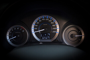 detail with the gauges on the dashboard of a car