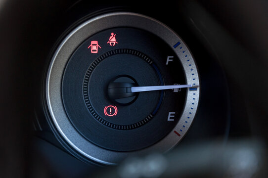 detail with the gauges on the dashboard of a car