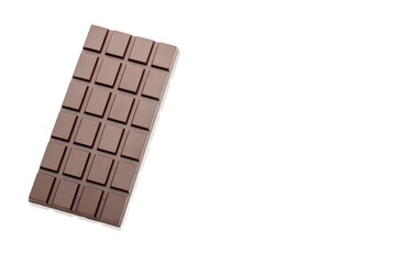 Bar of natural dark chocolate on a white background. Copy space