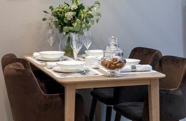 table with chairs and cutlery