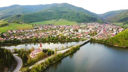 lake with church in the mountains
