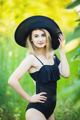 girl in black swimsuit