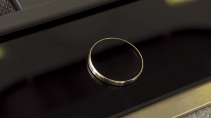 Close up of a modern induction stove control panel. Household utensils. Twist pad on a control sensor panel, modern technologies for the kitchen.