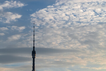 Obraz premium TV tower against a cloudy sky