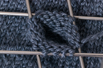 Start knitting on four knitting needles. Close-up