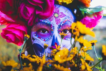 Foto op Aluminium woman with makeup and flowers in front of her © Juan