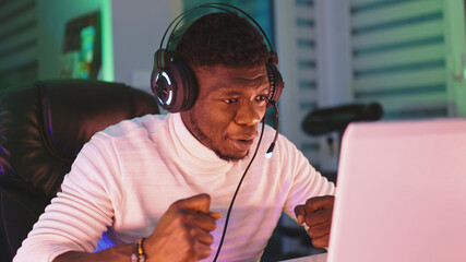 Portrait shot of disappointed young black man professional game player losing in video game. High quality photo