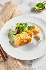 Pie with liver and cream sauce