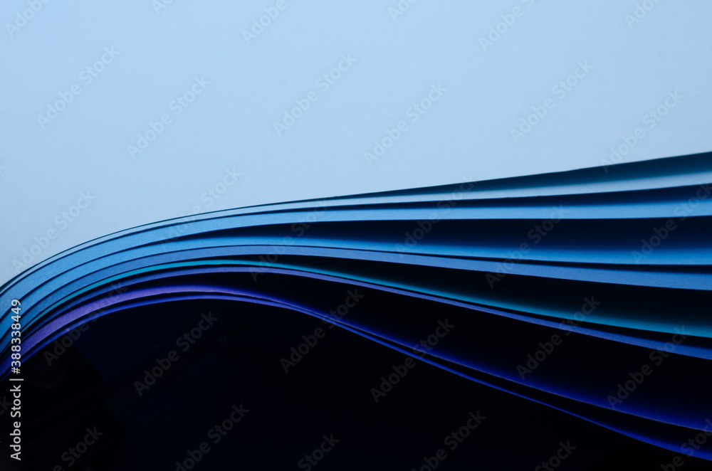 Poster abstract bright soft design background with blue wavy curved lines in dynamic style, template banner