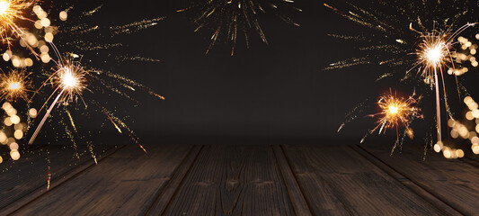 Silvester / New Year background banner panorama - sparklers firework, bokeh lights and wooden stage...