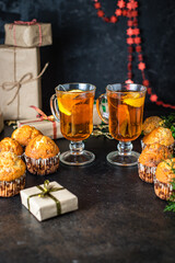 homemade muffins cupcakes and cup of tea christmas festive table setting holidays festive party new year gift tasty serving size portion top view copy space food background rustic