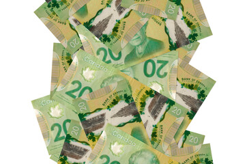 20 Canadian dollars bills flying down isolated on white. Many banknotes falling with white copyspace on left and right side