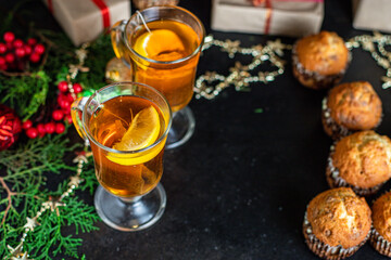 homemade muffins cupcakes and cup of tea christmas festive table setting holidays festive party new year gift tasty serving size portion top view copy space food background rustic