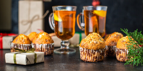 homemade muffins cupcakes and cup of tea christmas festive table setting holidays festive party new year gift tasty serving size portion top view copy space food background rustic