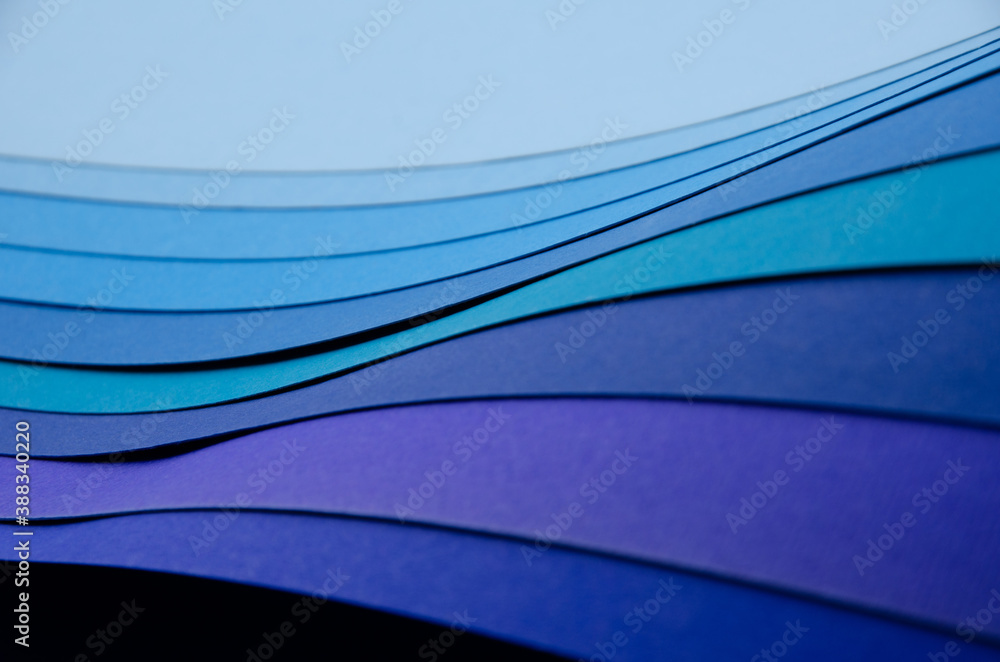 Poster abstract bright soft design background with blue wavy curved lines in dynamic style, template banner