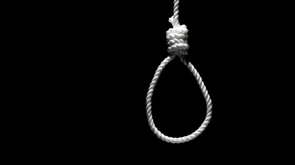 Rope noose on black background. Loop from a rope. Depression of burnout. Terrible life situation. Copy space.
