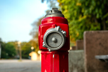 Red fire hydrant in Europe.
