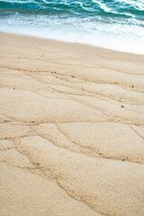 Fototapeta na wymiar pattern of sand in the beach.