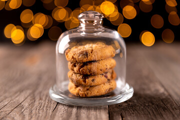 Cookies on wooden table with lights