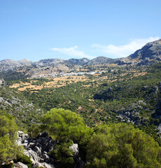 Fototapeta na wymiar Landscape of the Sierra de Grazalema Natural Park with the village of Benaocaz in the background, Cádiz province Andalusia Spain